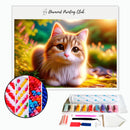 Broderie diamant Chat mignon dans l'herbe | Diamond-painting-club.com
